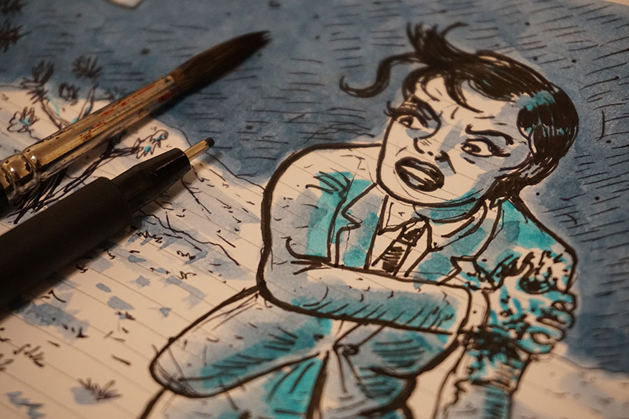 close up photo of my sketchbook doing an inktober drawing.