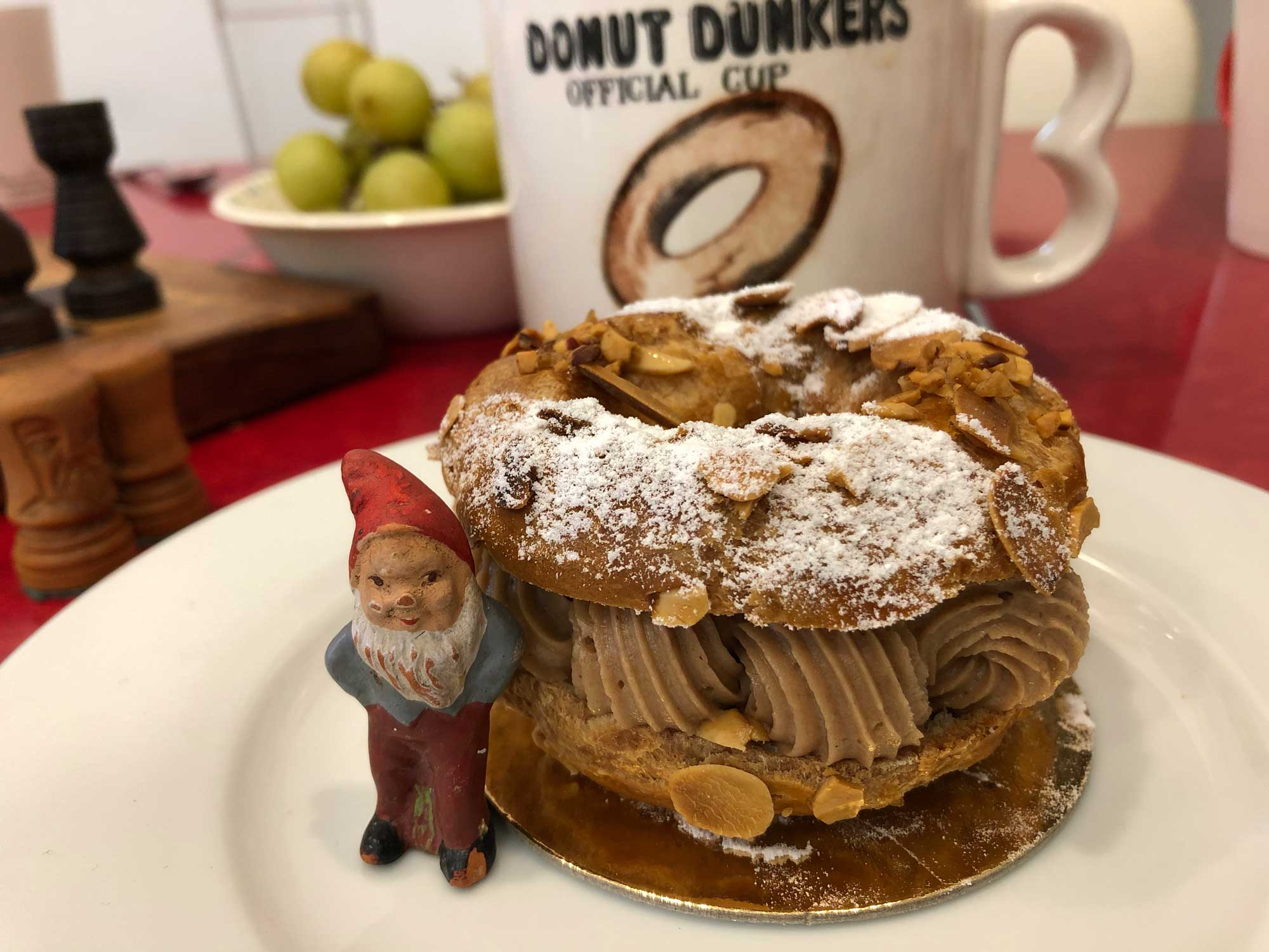 Coffee cup and french pastry.