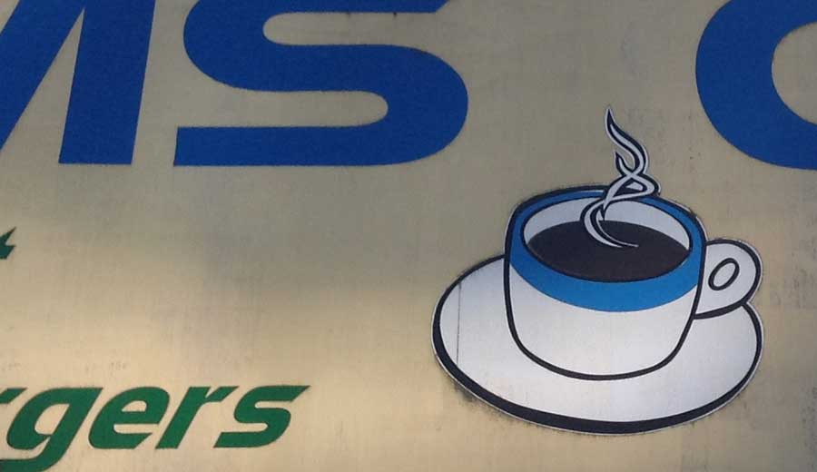 photo coffee drawing on an awning. New Westminster, BC, CANADA.