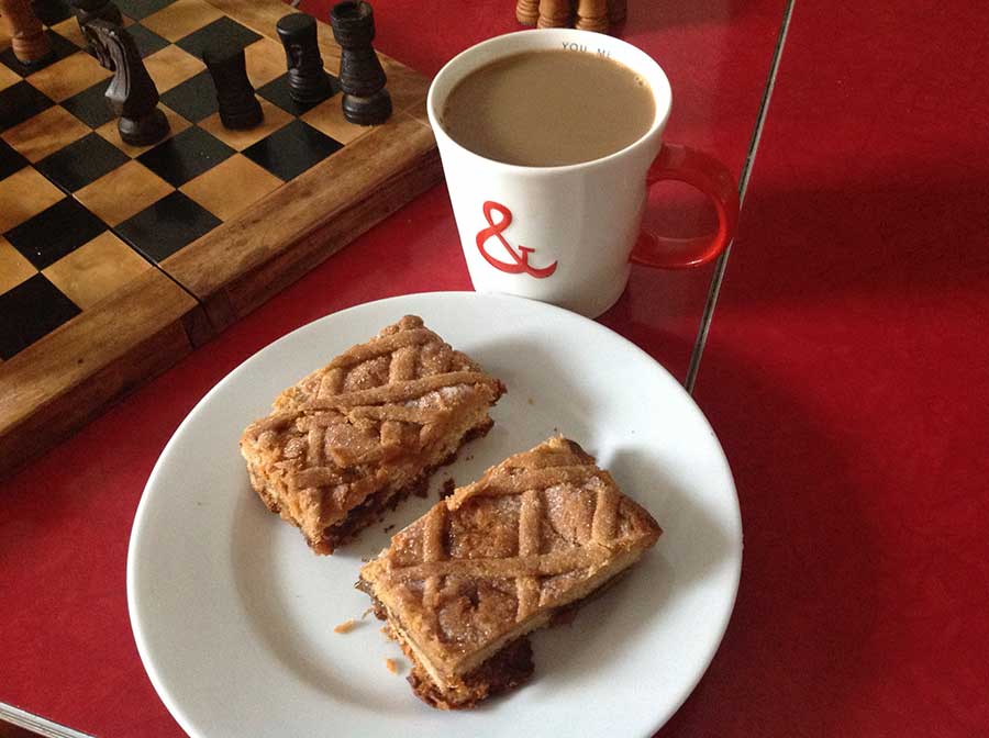 photo of coffee cup and Salvadoran semita.